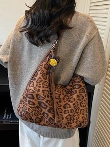 Fashionable leopard print tote bag with large capacity and decorative yellow pompom charm