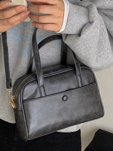 Vintage black faux leather pillow bag with double handles and long shoulder strap for women