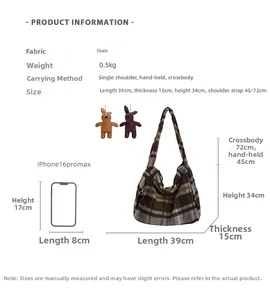 Detailed view of brown plaid tote bag with cute bear charms and size reference