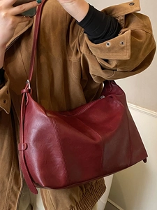 Vintage burgundy faux leather tote bag with adjustable strap for daily commute wear