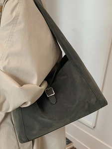 Minimalist dark grey suede crescent shoulder bag with silver buckle strap and large capacity