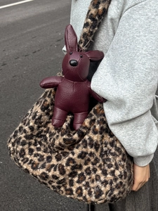 Stylish large capacity leopard print faux fur tote bag with a red rabbit leather charm