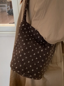 Brown fleece tote bag with cream polka dots and shoulder strap for autumn fashion