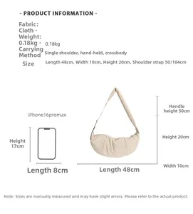Detail view of a beige nylon crescent bag compared to a phone showing large capacity