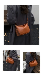 Détail d'un sac demi-lune vintage marron avec franges en cuir et bandoulière réglable