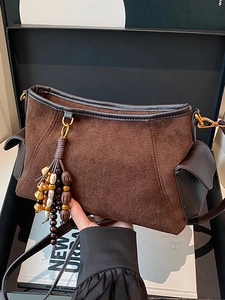 Retro brown suede underarm bag with beaded tassels and adjustable shoulder strap