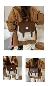 Detailansicht des Vintage-Farbblock-Designs und der hochwertigen Lederriemen am Rucksack