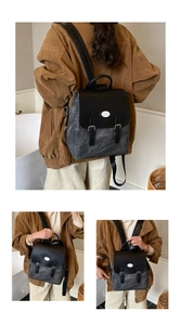 Detailansicht grauer Vintage-Rucksack mit schwarzer Lederklappe und Doppel-Dornschnalle