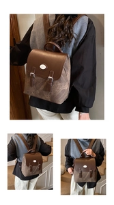 Details des braunen Vintage-Lederrucksacks mit Tragegriff und verstellbaren Schultergurten