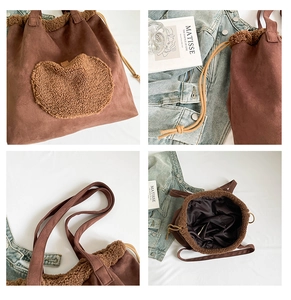 Dettagli della borsa tote in pelle scamosciata marrone con ricamo a cuore e coulisse