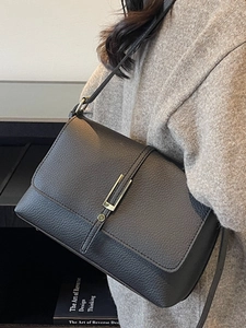 Minimalist dark gray litchi texture shoulder bag with metallic buckle and long strap