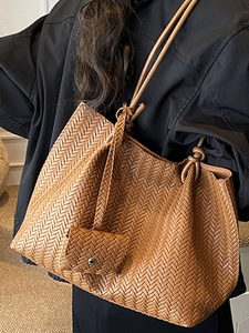 Brown woven leather tote bag with matching pouch and large capacity for casual daily wear