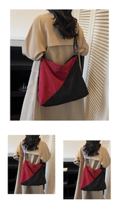 Detail of red and black corduroy tote bag with ethnic geometric embroidered strap