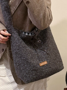 Retro charcoal grey faux fur crossbody bag with drawstring and plaid lining