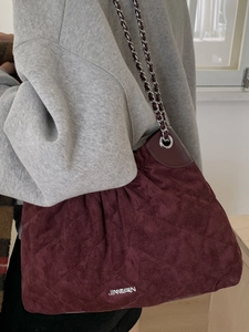 Chic burgundy quilted suede bucket bag with chain strap for women shoulder style