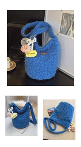 Detailed texture of blue plush bucket bag with cute cherry pendant and Star-picking text