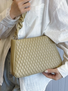 Minimalist large hobo bag in olive green with quilted pattern and ruched strap