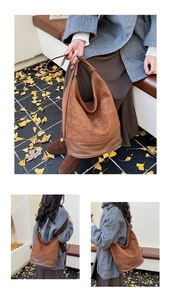 Detailed view of dark brown hobo bag with suede texture and smooth leather paneling