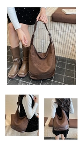 Detail view showing brown hobo bag with matte suede texture and leather stitching