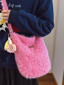 Pink plush faux mohair bucket bag with flower charm and Bear-picking leather tag