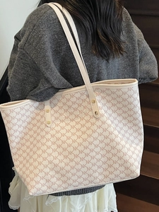 Minimalist beige tote bag with monogram pattern for women stylish commuter shoulder bag