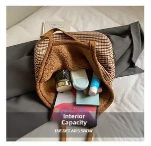 Detailed interior of vintage plaid tote bag showing large capacity for essentials