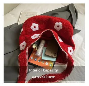 Detail showing internal capacity of plush floral tote bag with items inside