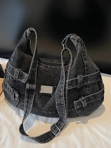 Retro washed black denim hobo bag with adjustable wide strap and metallic buckle details