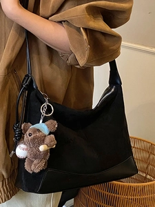 Retro black suede hobo bag for women with a cute teddy bear pendant on shoulder strap