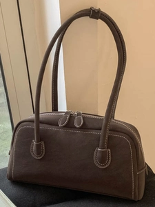 Retro dark brown suede hobo bag with contrast stitching and dual metal zippers