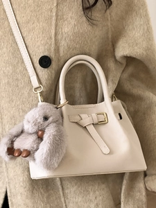 Retro cream white underarm tote bag with plush bunny charm and buckle decoration