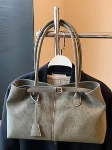 Minimalist grey-green tote bag with long straps and gold buckle for women's daily commute