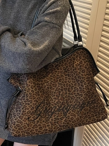 Large leopard print tote bag with black embroidery and leather handles for women