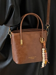 Borsa a secchiello retrò in ecopelle marrone con perline colorate e logo dorato