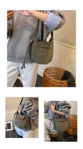 Detail of olive green suede bucket bag featuring contrast stitching and drawstring closure