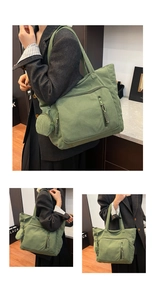 Dettaglio della borsa tote in velluto verde con tasche a zip e un piccolo borsellino laterale