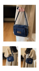 Détail d'un sac bandoulière rétro en jean bleu avec sangle réglable et étiquette en cuir