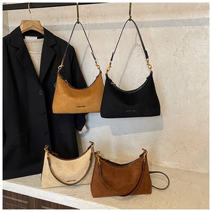 Collection of minimalist hobo underarm bags in suede texture with gold metal hardware details