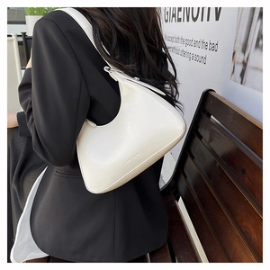 Chic white leather hobo shoulder bag with Fashion & Bags logo on minimalist semi-circle body