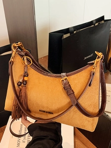 Chic mustard yellow suede half-moon underarm bag with retro fringe and wood beads