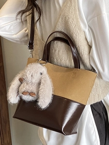 Retro contrast shoulder bag with yellow canvas and brown leather, featuring a cute rabbit charm
