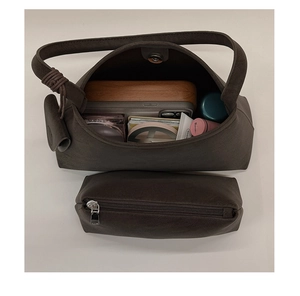 Top-down view of retro coffee faux suede hobo bag interior showing daily storage capacity
