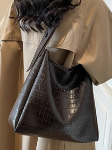 Elegant dark brown crocodile pattern tote bag with adjustable shoulder strap for women