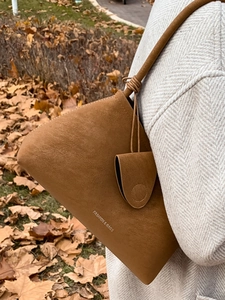 Vintage brown suede underarm shoulder bag with fashion lettering and chic pendant