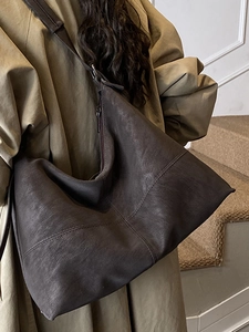 Minimalist large brown suede tote bag for women featuring a vintage matte leather finish