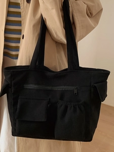 Fashionable black corduroy multi-pocket tote bag for casual commuting and daily storage