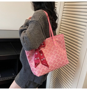 Pink tote bag with red Chinese Xi character jacquard and matching silk scarf detail