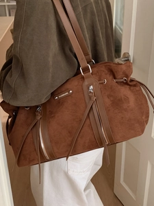 Large brown suede tote bag for women featuring stylish dual vertical zipper accents