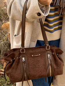 Large brown suede tote bag with fringe tassels and double zip for autumn daily commute
