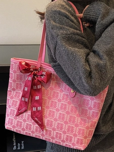 Pink minimalist tote bag with red Double Happiness pattern and silk ribbon accessory